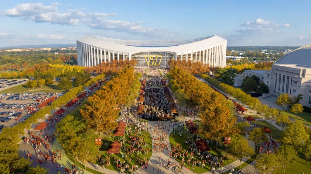 Washington Commanders Stadium - Aerial Festival Plaza_courtesy OJB Aerial rendering of the Washington Commanders stadium festival plaza, with allées of shade trees framing a central gathering space and tailgate area.